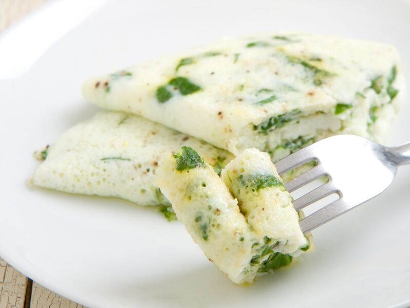 A classic protein omelet with herbs in the egg diet to lose weight
